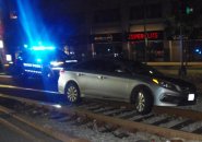 Car on the Green Line tracks at Fuller Street