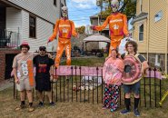 The DeMasi-Marx family on Tyndale Street with Home Depot giant skeletons dressed as DeathKings