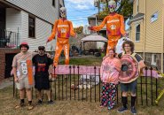 The DeMasi-Marx family on Tyndale Street with Home Depot giant skeletons dressed as DeathKings