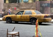 Boarded up building and New York cab on Federal Street