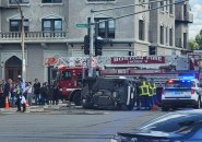 Flipped SUV at Commonwealth and Harvard avenues