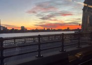 View of the sunset from a Red Line train crossing the Longfellow Bridge into Cambridge