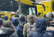 People jammed at a shuttle stop in Copley Square