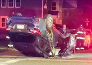 Overturned car at Washington Street and Wellesmere Road