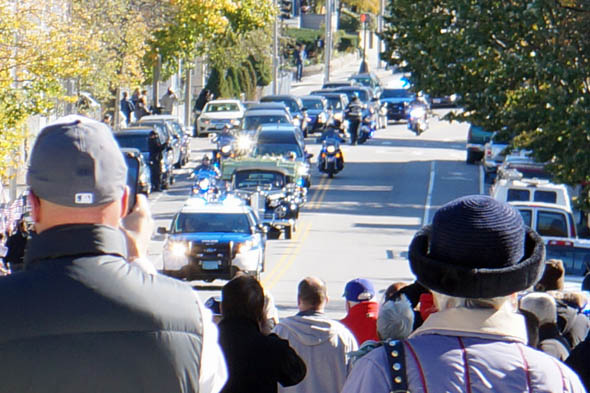 Funeral procession comes down Cummins Highway