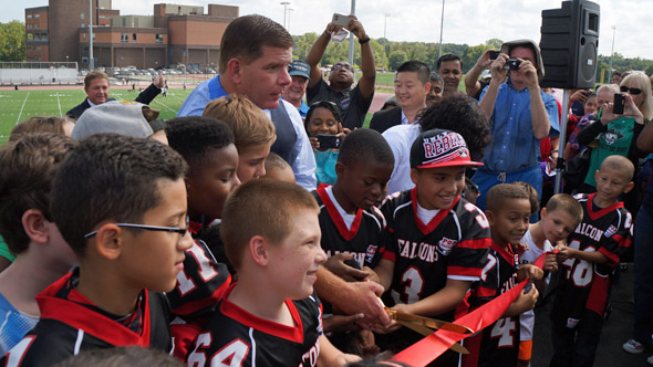 Walsh, kids cut ribbon for new athletics fields