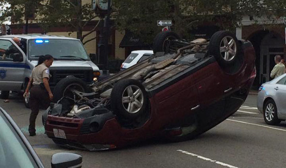 Car flipped in Roslindale Square