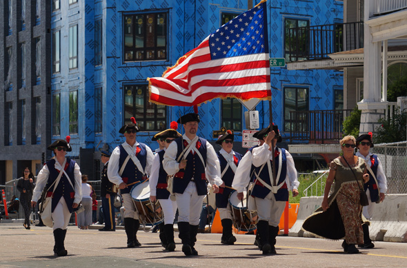 A lot of flags in the Dorchester Day parade | Universal Hub