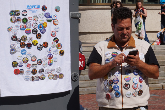 Button man at the climate-change rally