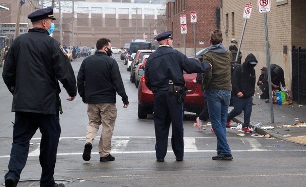 Man been aided back onto the sidewalk