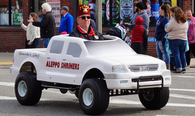 Shriner in tiny vehicle