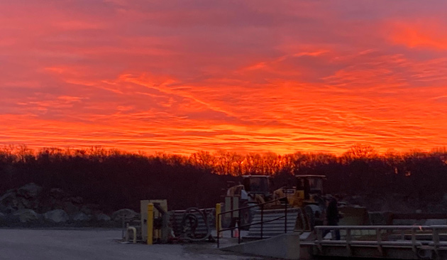 Orange sunrise over West Roxbury Crushed Stone