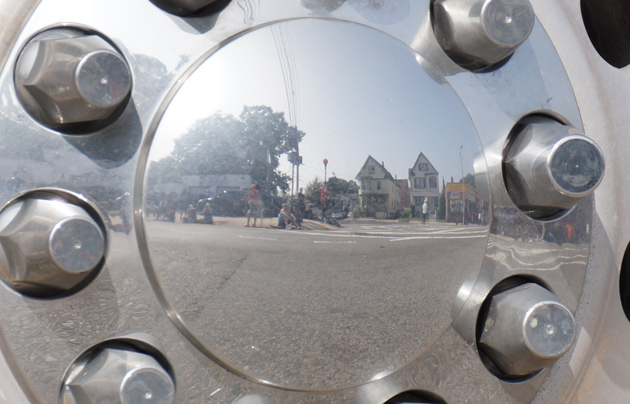 House reflections in a hubcap