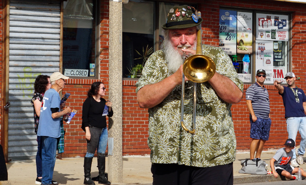 Blowing a trombone