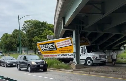 Truck peeled back by Kenmore ramp on Storrow Drive