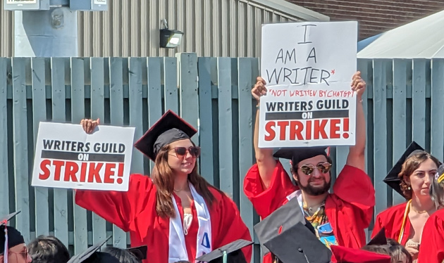 Students with pro-writer's-union signs