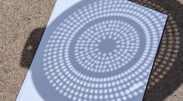 Colander on sidewalk