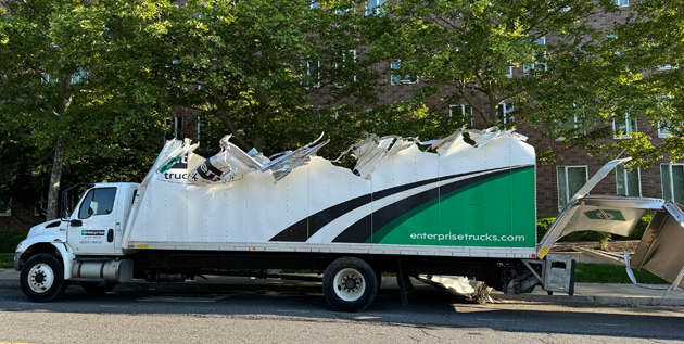 Sideview of wrecked Enterprise box truck